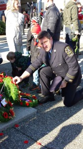 Remembrance Day ceremony at the Cloverdale Cenotaph - Mike Starchuk placing his poppy on the Surrey Fire Fighters' wreath - MikeStarchuk.com