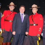  Mike posing with the RCMP and Surrey Fire Department Honour Guard