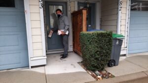Mike Starchuk on the last day of campaigning, putting flyers on doorknobs - MikeStarchuk.com