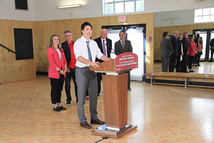 Prime Minister Justin Trudeau talks to the media March 28 at Don Christian Rec. Centre as part of a B.C. tour to drum up support for the Liberal’s 2024 budget (to be tabled April 16). Jenna Sudds, Minister of Families (left), stands in the background with Cloverdale-Langley City MP John Aldag, Deputy Premier of British Columbia Mike Farnworth, and Surrey-Cloverdale MLA Mike Starchuk. (Photo: Malin Jordan)