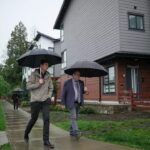 David Eby & Mike Starchuk walking in the rain to a campaign event - MikeStarchuk.com